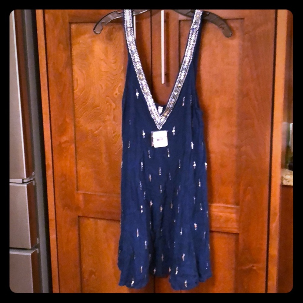 Kind of a dark bluish teal free people dress